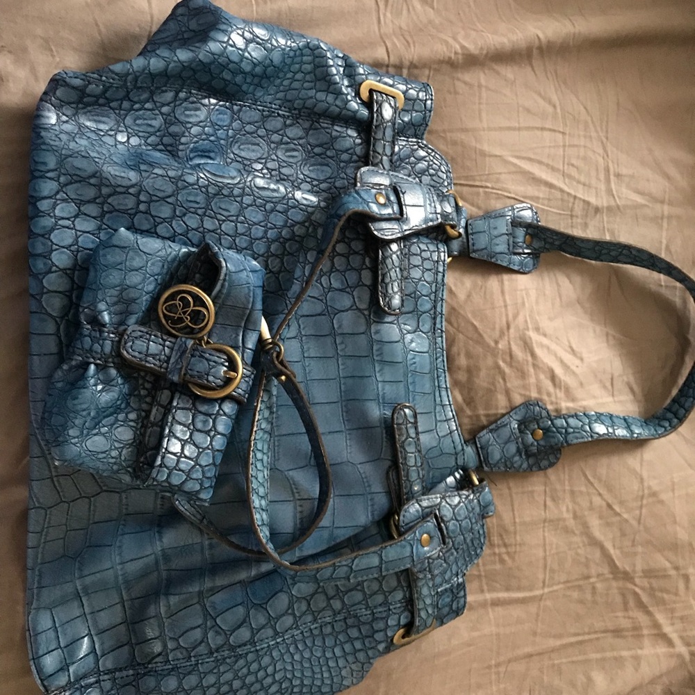 Jessica Simpson Handbag with matching clutch.